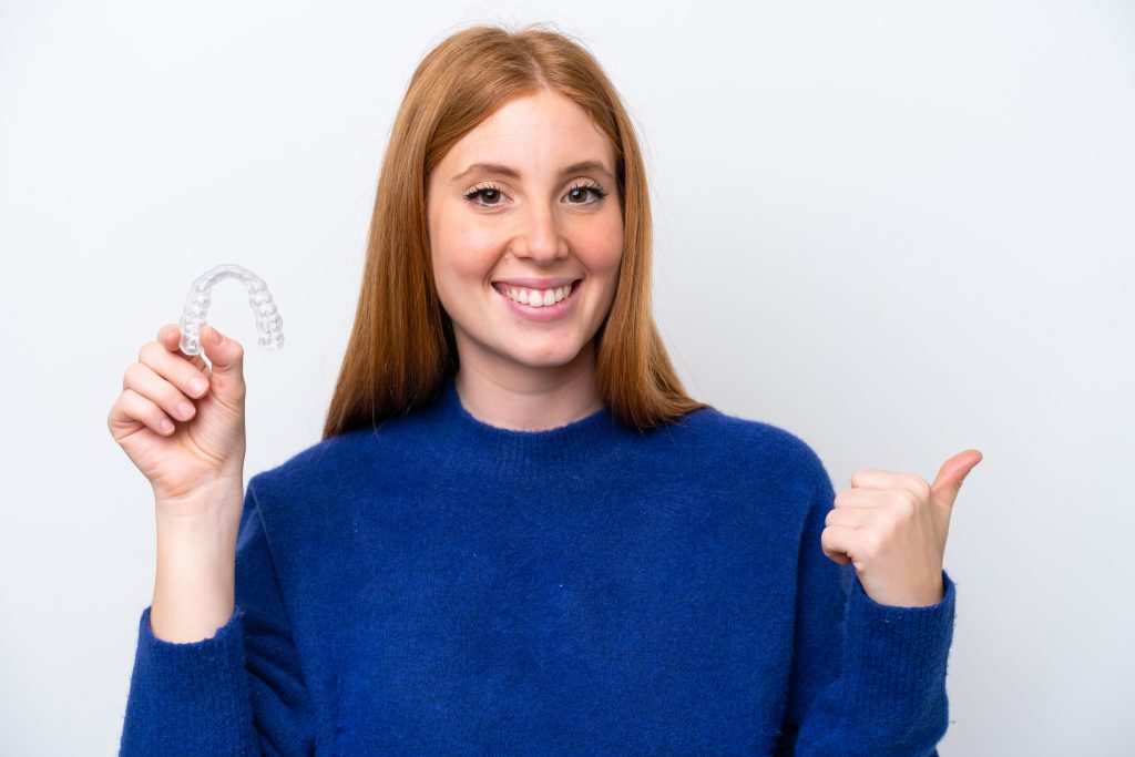 Clear Aligners vs Traditional Braces for Adults: Cost, Care & Comparison